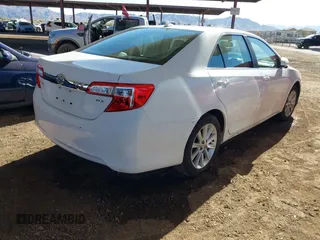 2014 Toyota Camry SE with VIN 4T1BK1FK2EU543220, listed as a IAAI auction lot 41416785 with 198,011 mi miles. Bid and sale history available at carsss.com. Image 4.