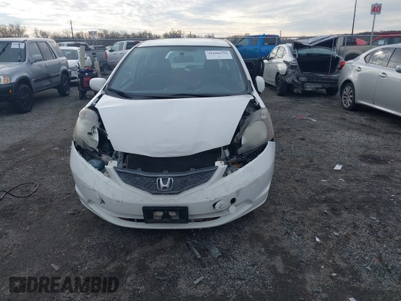 2013 Honda Fit with VIN JHMGE8H39DC005052, listed as a IAAI auction lot 41008236 with 124,874 mi miles. Bid and sale history available at carsss.com. Image 12.
