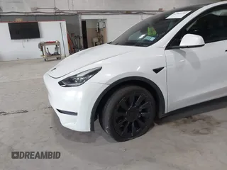 2020 Tesla Model Y Long Range z VIN 5YJYGDEE5LF041935, wystawiony jako IAAI lot #42369750 z przebiegiem 79 540 mil mil oraz . Historia ofert i sprzedaży dostępna na DreamBid. Obrazek 21.