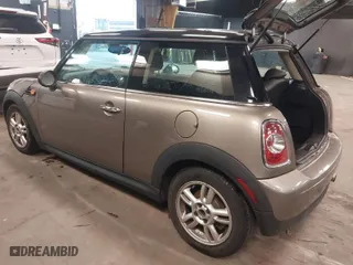 2013 MINI Cooper Hardtop with VIN WMWSU3C55DT679450, listed as a IAAI auction lot 41891583 with 106,410 mi miles. Bid and sale history available at carsss.com. Image 3.