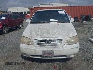 2005 Kia Sedona LX with VIN KNDUP132856700868, listed as a IAAI auction lot 41661428 with 229,142 mi miles. Bid and sale history available at carsss.com. Image 6.