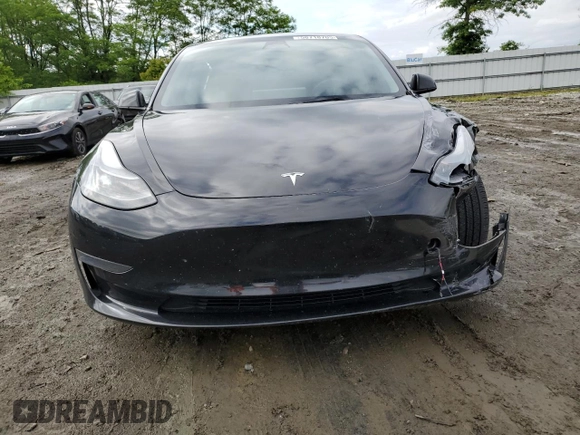2023 Tesla Model 3 with VIN 5YJ3E1EA3PF451764, listed as a Copart auction lot 58718705 with 33,965 mi miles and Salvage title. Bid and sale history available at DreamBid. Image 5.