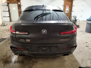 2021 BMW X4 M40i with VIN 5UX2V5C05M9H10615, listed as a Copart auction lot 71689363 with 0 mi miles. Bid and sale history available at carsss.com. Image 6.