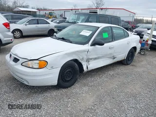2005 Pontiac Grand Am SE with VIN 1G2NE52E95M191936, listed as a IAAI auction lot 41940665 with 247,461 mi miles. Bid and sale history available at carsss.com. Image 2.