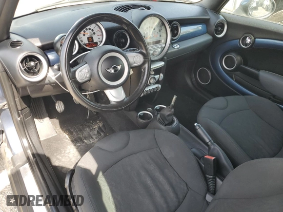 2010 MINI Convertible S with VIN WMWMS3C5XATY51076, listed as a Copart auction lot 48532735 with 104,901 mi miles and Clean title. Bid and sale history available at DreamBid. Image 8.