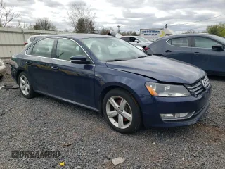 2015 Volkswagen Passat S with VIN 1VWAT7A30FC107907, listed as a Copart auction lot 53165615 with 196,059 mi miles and Clean title. Bid and sale history available at DreamBid. Image 4.