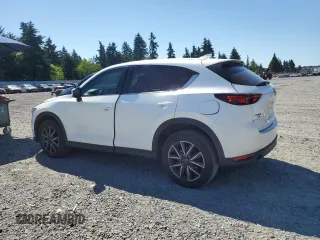 2018 Mazda CX-5 Grand Touring with VIN JM3KFBDM0J0419989, listed as a Copart auction lot 62868005 with 120,217 mi miles and Salvage title. Bid and sale history available at DreamBid. Image 2.