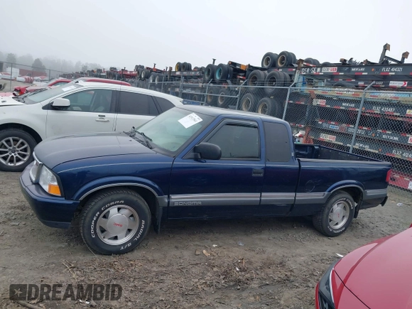 2000 GMC Sonoma SLS z VIN 1GTCS19W9Y8237166, wystawiony jako IAAI lot #41513561 z przebiegiem 177 448 mil mil oraz . Historia ofert i sprzedaży dostępna na DreamBid. Obrazek 15.