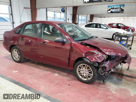 2006 Ford Focus S z VIN 1FAFP34N76W153239, wystawiony jako Copart lot #53085555 z przebiegiem 118 259 mil mil oraz Szkody całkowita. Historia ofert i sprzedaży dostępna na DreamBid. Obrazek 4.