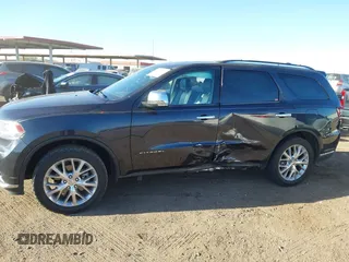 2015 Dodge Durango Citadel с VIN 1C4RDHEGXFC907426, выставлен на аукционе IAAI как лот 41510971 с пробегом 100 145 миль миль и . История ставок и продаж доступна на DreamBid. Изображение 14.