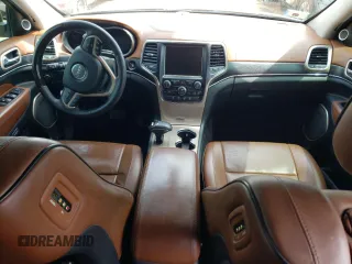 2015 Jeep Grand Cherokee Summit with VIN 1C4RJFJTXFC661574, listed as a Copart auction lot 65592954 with 110,791 mi miles and Salvage Title. Bid and sale history available at carsss.com. Image 8.