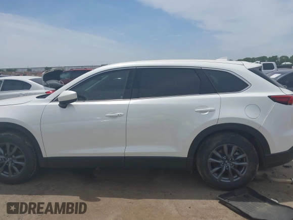 2021 Mazda CX-9 Touring with VIN JM3TCACY9M0526376, listed as a IAAI auction lot 42264478 with 74,671 mi miles and . Bid and sale history available at DreamBid. Image 14.
