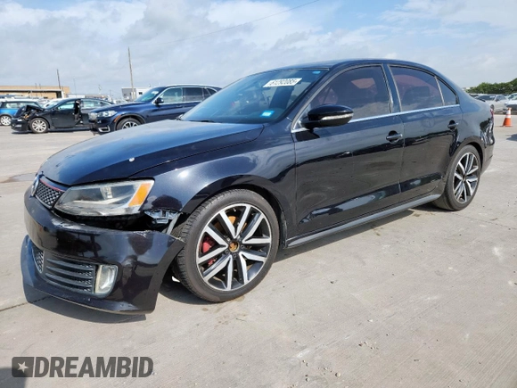 2014 Volkswagen Jetta GLI Edition 30 z VIN 3VW4S7AJ1EM390796, wystawiony jako Copart lot #61292085 z przebiegiem 138 224 mil mil oraz Czysty tytuł • Clean title. Historia ofert i sprzedaży dostępna na DreamBid. Obrazek 1.