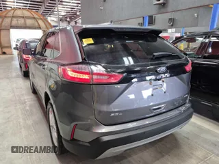 2022 Ford Edge SEL z VIN 2FMPK4J93NBA63351, wystawiony jako IAAI lot #42250112 z przebiegiem 41 809 mil mil oraz . Historia ofert i sprzedaży dostępna na DreamBid. Obrazek 1.