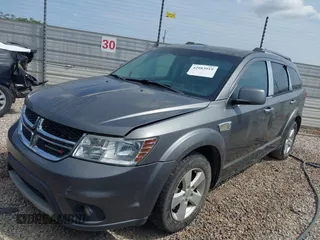2012 Dodge Journey SXT with VIN 3C4PDCBB5CT392743, listed as a IAAI auction lot 42083919 with 170,486 mi miles and . Bid and sale history available at DreamBid. Image 2.