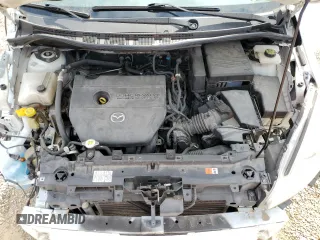 2012 Mazda 5 Touring z VIN JM1CW2CL0C0123721, wystawiony jako Copart lot #52415065 z przebiegiem 168 659 mil mil oraz Szkoda całkowita • Salvage title. Historia ofert i sprzedaży dostępna na DreamBid. Obrazek 12.