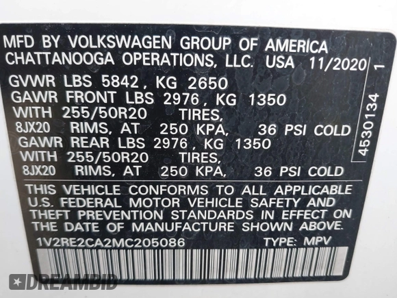 2021 Volkswagen Atlas SE z VIN 1V2RE2CA2MC205086, wystawiony jako IAAI lot #41902654 z przebiegiem 111 024 mil mil oraz . Historia ofert i sprzedaży dostępna na DreamBid. Obrazek 9.