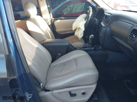 2005 Chevrolet TrailBlazer LS with VIN 1GNET16S556117614, listed as a IAAI auction lot 41320947 with 177,726 mi miles. Bid and sale history available at carsss.com. Image 4.