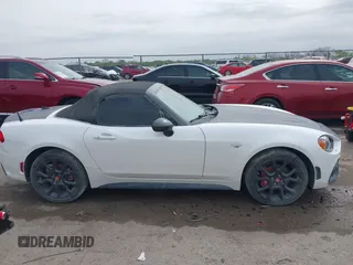 2018 FIAT 124 Spider Classica z VIN JC1NFAEK7J0138623, wystawiony jako IAAI lot #41919114 z przebiegiem 26 327 mil mil oraz . Historia ofert i sprzedaży dostępna na DreamBid. Obrazek 13.
