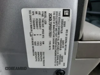 2005 Chevrolet Equinox LT z VIN 2CNDL73F656178331, wystawiony jako Copart lot #54723285 z przebiegiem Nie podano mil oraz Szkoda całkowita • Salvage title. Historia ofert i sprzedaży dostępna na DreamBid. Obrazek 13.