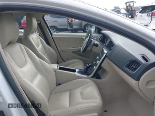 2015 Volvo S60 T5 Drive-E Premier with VIN YV126MFK4F2349564, listed as a IAAI auction lot 41711836 with 59,897 mi miles. Bid and sale history available at carsss.com. Image 5.
