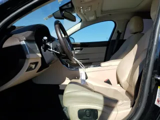 2018 Jaguar XF 25t Prestige with VIN SAJBE4FX9JCY64763, listed as a Copart auction lot 86058104 with 76,900 mi miles and Salvage Title. Bid and sale history available at carsss.com. Image 7.