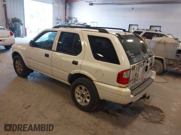 2004 Isuzu Rodeo S with VIN 4S2CK58W244313115, listed as a IAAI auction lot 42147475 with 186,594 mi miles and . Bid and sale history available at DreamBid. Image 3.
