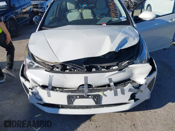 2017 Toyota Prius Two z VIN JTDKARFU9H3043444, wystawiony jako IAAI lot #41729481 z przebiegiem 148 706 mil mil oraz . Historia ofert i sprzedaży dostępna na DreamBid. Obrazek 6.