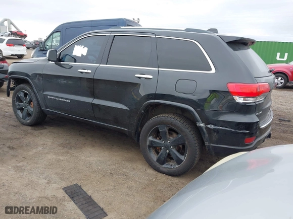 2014 Jeep Grand Cherokee Overland with VIN 1C4RJFCG6EC121654, listed as a IAAI auction lot 42051730 with 163,853 mi miles. Bid and sale history available at carsss.com. Image 3.