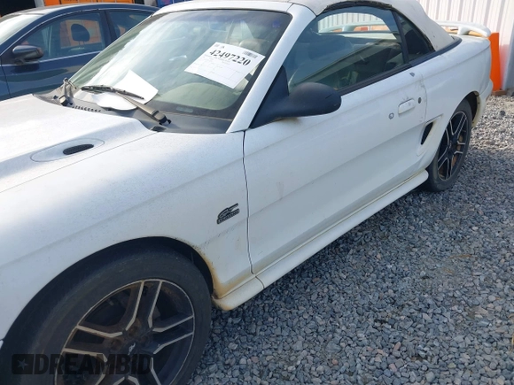 1994 Ford Mustang z VIN 1FALP45T2RF189589, wystawiony jako IAAI lot #42497220 z przebiegiem 98 565 mil mil oraz . Historia ofert i sprzedaży dostępna na DreamBid. Obrazek 14.