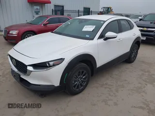 2022 Mazda CX-30 S with VIN 3MVDMBALXNM422418, listed as a IAAI auction lot 41531552 with 21,909 mi miles and . Bid and sale history available at carsss.com. Image 2.