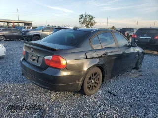 2006 BMW 3 Series 325i with VIN WBAVB13556PT27892, listed as a Copart auction lot 61299455 with 121,678 mi miles and Salvage title. Bid and sale history available at DreamBid. Image 3.