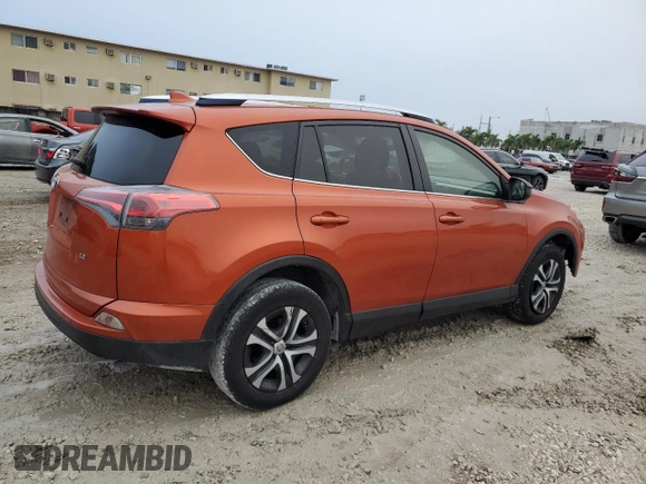2016 Toyota RAV4 LE with VIN JTMZFREV9GD091819, listed as a Copart auction lot 41958845 with 192,821 mi miles and Salvage Title. Bid and sale history available at carsss.com. Image 3.