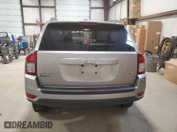 2016 Jeep Compass High Altitude with VIN 1C4NJDAB6GD753142, listed as a Copart auction lot 76963344 with 122,367 mi miles and Salvage Title. Bid and sale history available at carsss.com. Image 6.