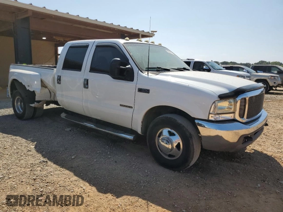 1999 Ford F-350 XL z VIN 1FTWW32F7XED47740, wystawiony jako Copart lot #69288404 z przebiegiem 201 638 mil mil oraz Szkoda całkowita • Salvage title. Historia ofert i sprzedaży dostępna na DreamBid. Obrazek 4.