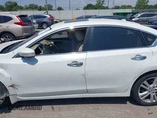 2013 Nissan Altima SV with VIN 1N4BL3AP7DN523429, listed as a IAAI auction lot 42016429 with 188,953 mi miles and . Bid and sale history available at DreamBid. Image 14.