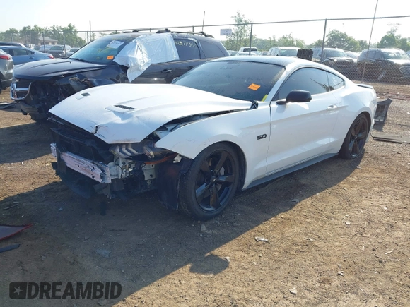 2023 Ford Mustang GT with VIN 1FA6P8CF6P5304456, listed as a IAAI auction lot 42407246 with 59,538 mi miles and . Bid and sale history available at DreamBid. Image 18.