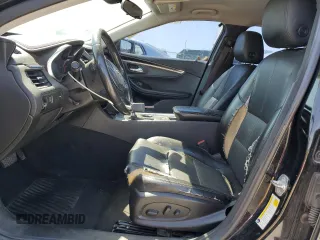 2017 Chevrolet Impala LT with VIN 1G1105S32HU178479, listed as a Copart auction lot 52513265 with 203,266 mi miles and Salvage Title. Bid and sale history available at DreamBid. Image 7.