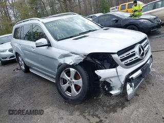 2017 Mercedes-Benz GLS 450 with VIN 4JGDF6EE9HA787099, listed as a IAAI auction lot 41971505 with 80,159 mi miles and . Bid and sale history available at DreamBid. Image 1.