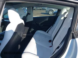 2023 Tesla Model 3 z VIN 5YJ3E1EA4PF505850, wystawiony jako IAAI lot #41310597 z przebiegiem 70 211 mil mil oraz . Historia ofert i sprzedaży dostępna na DreamBid. Obrazek 8.