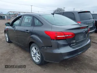 2016 Ford Focus SE with VIN 1FADP3F22GL201887, listed as a IAAI auction lot 41918923 with 119,198 mi miles. Bid and sale history available at carsss.com. Image 3.