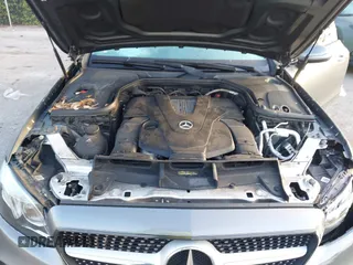 2018 Mercedes-Benz E 400 with VIN WDD1J6FB1JF021229, listed as a IAAI auction lot 42197884 with 72,011 mi miles and . Bid and sale history available at DreamBid. Image 10.