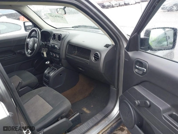2014 Jeep Patriot Sport with VIN 1C4NJRBB7ED601038, listed as a IAAI auction lot 41858145 with 174,903 mi miles. Bid and sale history available at carsss.com. Image 5.