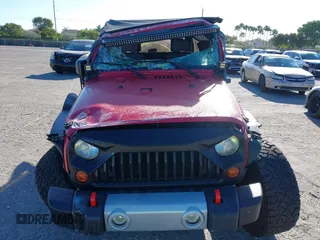 2008 Jeep Wrangler Unlimited X with VIN 1J4GB391X8L649234, listed as a IAAI auction lot 41837164 with 154,035 mi miles and . Bid and sale history available at DreamBid. Image 12.