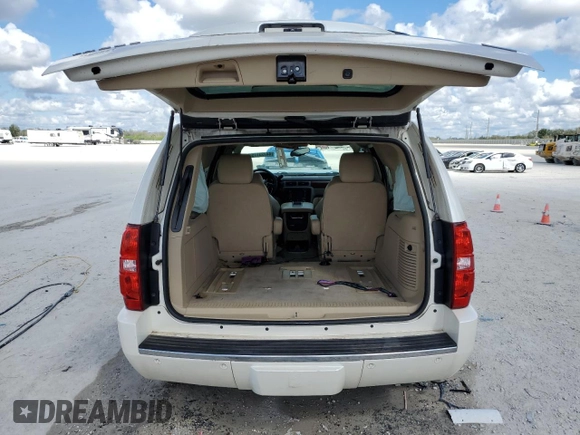 2012 Chevrolet Tahoe LTZ with VIN 1GNSCCE08CR214560, listed as a Copart auction lot 44723175 with 137,489 mi miles and Salvage title. Bid and sale history available at DreamBid. Image 6.