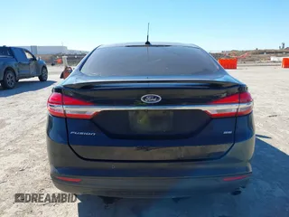 2018 Ford Fusion SE z VIN 3FA6P0H77JR180057, wystawiony jako IAAI lot #41729451 z przebiegiem 122 200 mil mil oraz . Historia ofert i sprzedaży dostępna na DreamBid. Obrazek 16.