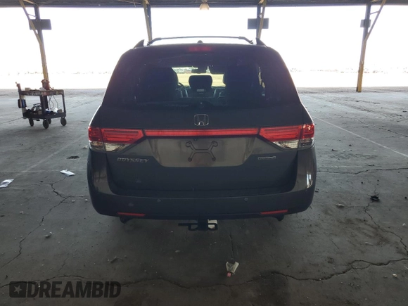 2014 Honda Odyssey Touring with VIN 5FNRL5H99EB111525, listed as a Copart auction lot 61986005 with 137,905 mi miles and Salvage title. Bid and sale history available at DreamBid. Image 6.