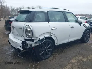 2014 MINI Countryman S with VIN WMWZC3C55EWP52138, listed as a IAAI auction lot 40695292 with 83,083 mi miles and . Bid and sale history available at DreamBid. Image 4.