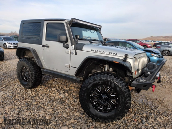 2007 Jeep Wrangler Rubicon z VIN 1J8GA64157L125319, wystawiony jako Copart lot #82929184 z przebiegiem 82 019 mil mil oraz Szkoda całkowita • Salvage title. Historia ofert i sprzedaży dostępna na DreamBid. Obrazek 4.