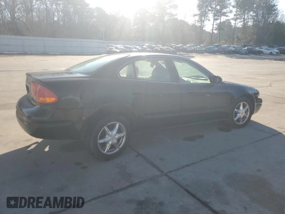 2000 Oldsmobile Alero GLS z VIN 1G3NF52E5YC322556, wystawiony jako Copart lot #85916554 z przebiegiem 169 600 mil mil oraz Szkoda całkowita • Salvage title. Historia ofert i sprzedaży dostępna na DreamBid. Obrazek 3.